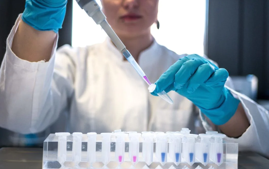 Human taking samples in lab Human taking samples in lab